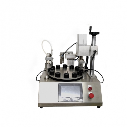 Turntable type syringe bottle filling and riveting capping integrated machine
